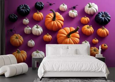 Halloween flat lay composition with pumpkins and black spiders on purple background, Minimalism concept Wall mural