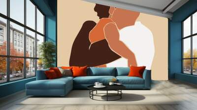 Father hug baby. Cute Afro family portrait on the beige isolated background. Wall mural