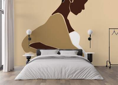 Pregnant black woman with with a bun on the head. Abstract faceless woman portrait. Wall mural