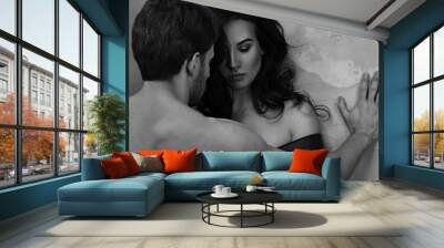 Guilty disappointed beautiful woman hugging her husband with thinking sad eyes . Closeup drama portrait. Wall mural