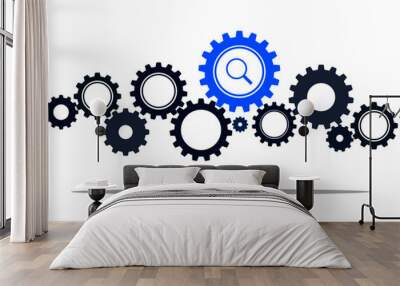 A cog wheel with a magnifying glass symbolizes a search concept or a search process Wall mural