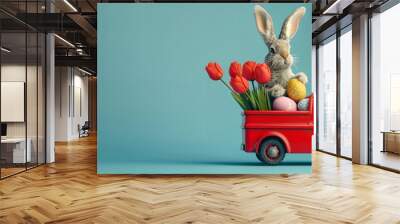 bunny in a red truck is carrying bouquet of tulips and eggs, blue background, Easter greeting card with copy space Wall mural