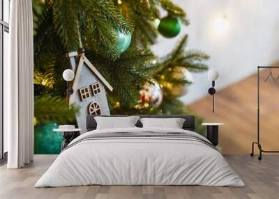 christmas toy wood house on fir branch , new year scandinavian decoration Wall mural