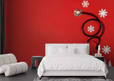 stethoscope and christmas decoration on red background, copy space. winter medicine card Wall mural