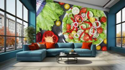 A plate full of bright fresh vegetable salad Wall mural