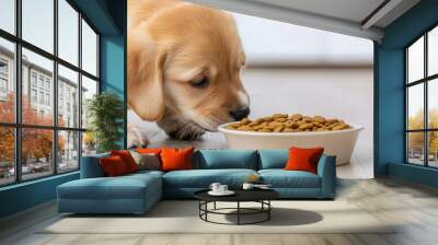 A cute puppy curiously enjoying its meal from a bowl, showcasing a moment of joy and innocence in a home setting. Wall mural