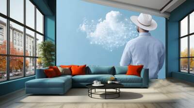 Man in white hat and cloud computing concept on blue background. Mixed media Wall mural