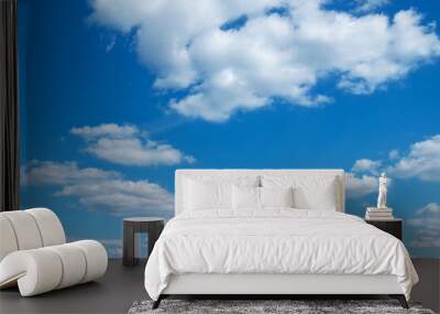 White clouds in blue sky. Wall mural