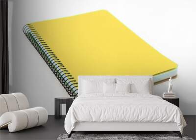 Yellow notebook isolated on white background Wall mural