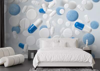 Floating white and blue pills and capsules Wall mural