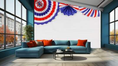 Decorations for 4th of July day of American independence, flag,  straws, paper fans. USA holiday decorations on a white wooden background, top view, flat lay	 Wall mural