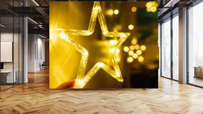 Stylish christmas golden star illumination with gold baubles, golden lights bokeh at home interior. Christmas decor. Seasons greeting card. Holiday background. Blinking Garlands.	 Wall mural