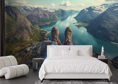 View from mountains lake river fjord - Hiking hiker traveler landscape adventure nature sport background panorama - Feet with hiking shoes from a woman standing resting on top of a high hill or rock Wall mural