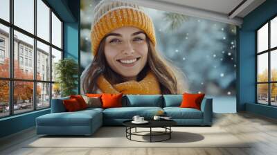 Young woman in winter snow portrait, wearing beanie hat and scarf, outdoors in cold, warmth clothing, copy space, smile in cozy fashion snowy forest nature Wall mural