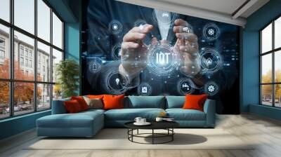 Businessman hand shows a block diagram of internet of things . Wall mural