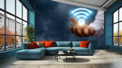 Hand shows a WiFi symbol . Wall mural