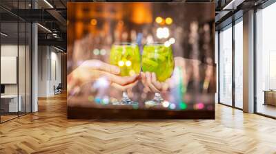 Two glasses of drink . Wall mural