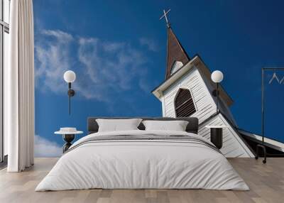 a church steeple against a clear blue sky Wall mural