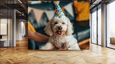 A dog wearing a party hat smiles for the camera. AI. Wall mural