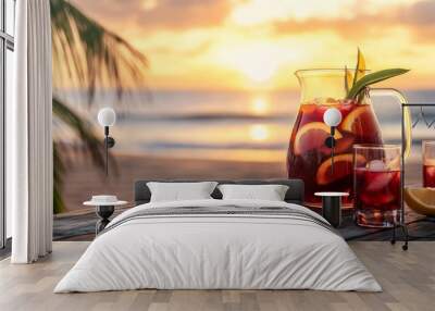 A jug of sangria at the beach at sunset Wall mural