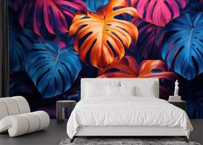 A vibrant collection of tropical leaves in bright neon colors creates an eyecatching look Wall mural