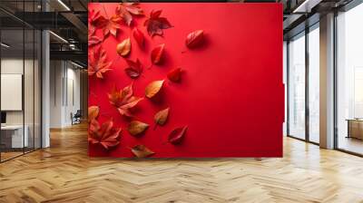 Autumn leaves on red background. Autumn background with copy space. Wall mural