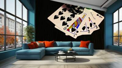 Black colours of poker game concept.  Plot with bones, chips and cards Wall mural