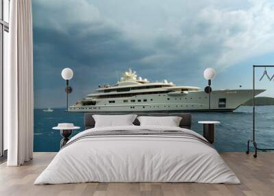 Luxury super yacht passing Korcula island in Adriatic, Croatia Wall mural