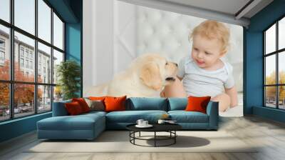 Baby girl with labrador puppy Wall mural