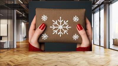 Close-up of a chic holiday party clutch with snowflake embroidery, paired with festive red nails, Christmas party clutch, Elegant accessory Wall mural