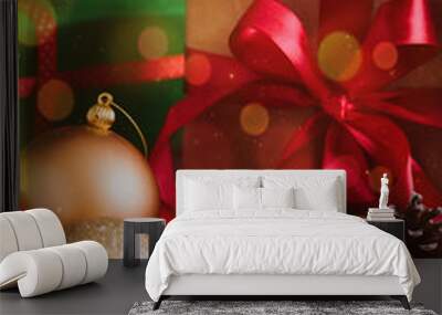 Composition with Christmas decorations  and gift on black background toned bokeh Wall mural