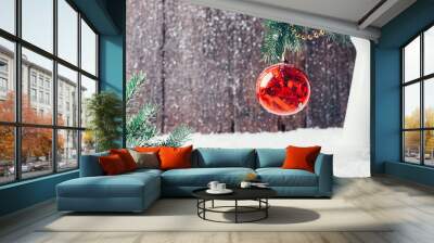 Composition with Christmas decorations in vase on dark wooden ba Wall mural