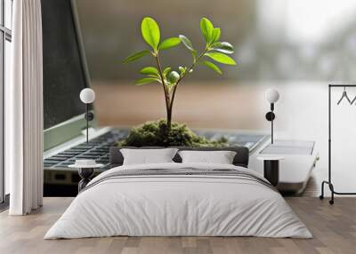 Environmental friendly concept tree growing from laptop sustainability ecology problems Wall mural