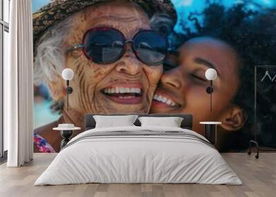 Grandmother and granddaughter share a loving moment at the beach. AI. Wall mural