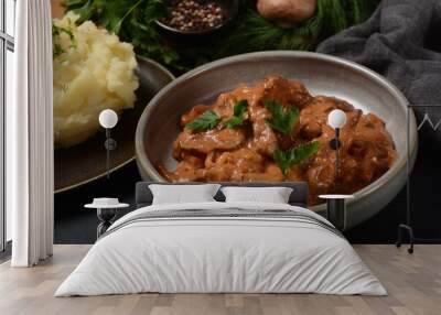 Traditional beef stroganoff in a ceramic bowl with mashed potato Wall mural