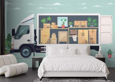 Illustration of a partially open moving truck loaded with boxes and house plants. Wall mural