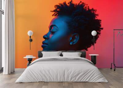 confident young woman with afro profile, orange and blue gradient Wall mural