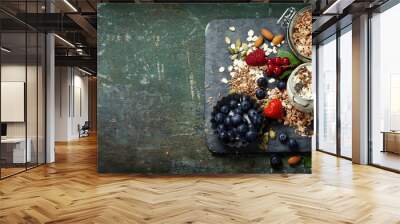 healthy breakfast of muesli, berries with yogurt and seeds Wall mural