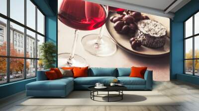 Red wine and cheese on concrete background Wall mural