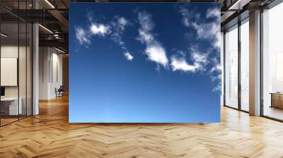 Blue sky and white feathery clouds. Copy space and background. Wall mural