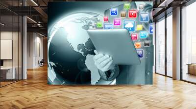 Business man use tablet pc with colorful application icons Wall mural