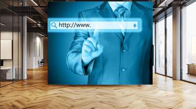 Businessman pushing virtual search bar Wall mural