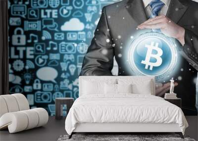 Businessman with protective gesture bitcoins Wall mural