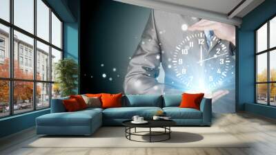 Image of businessman holding clock against illustration Wall mural