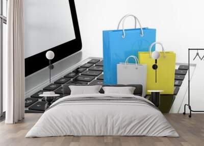 laptop and  shopping pags on white background Wall mural