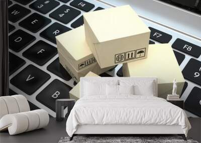 Technology business concept, shipping: cardboard package boxes on laptop. 3d rendering. Wall mural