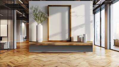 Minimalist interior mockup featuring a wooden frame, a white vase with delicate flowers, and two small white containers on a wooden shelf against a white wall. Wall mural