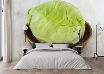 fresh green cabbage in dish Wall mural