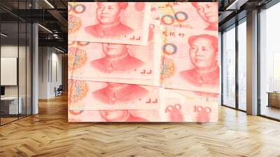 One hundred yuan banknotes are spread out on the table. Wall mural