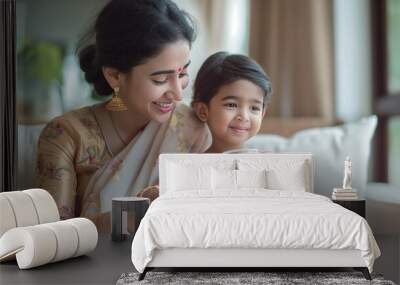 Indian mother in sari with little daughter holding glass of lactose free milk at home. Healthy nutrition from childhood, dairy products without lactose Wall mural